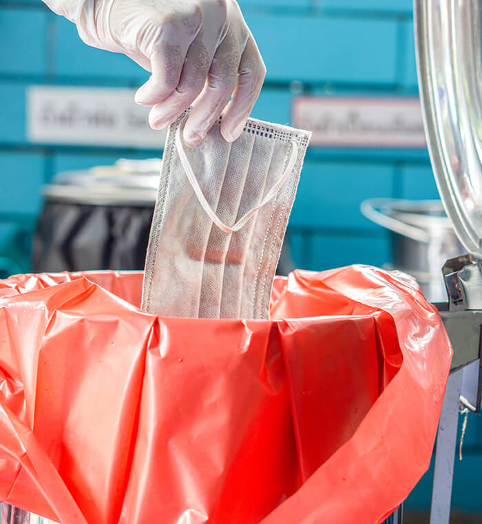 Disposing Waste in Autoclave Bag